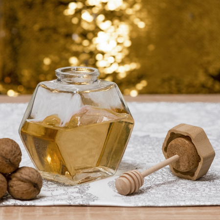 Słoiczek na miód z drewnianą łyżeczką