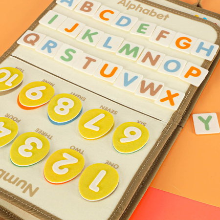 Tablica manipulacyjna sensoryczna montessori walizka dinozaury